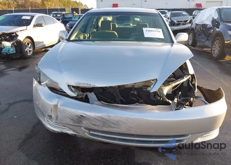 2003 Toyota Camry Le from USA, damaged, VIN 4T1BE32K13U230889